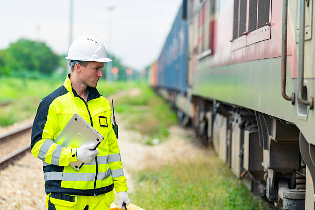 istock Male engineer maintain railroad track. 2227613559