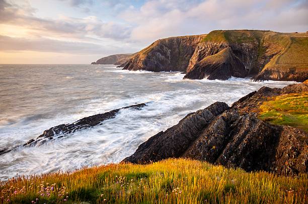 Dramatic coastline at sunset in Pembrokeshire national park, Wales