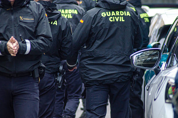istock Police Officers Working Together at a Public Event. Concept: Collaboration and coordination. 2227615002