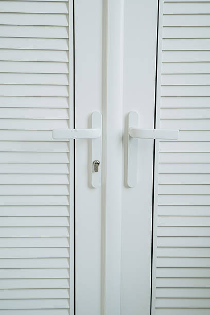 istock White Modern Door with Sleek Handles and Shutter Design 2227615537
