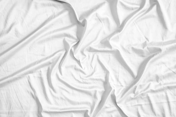 istock Abstract white wrinkled bedding sheet fabric texture background 2227616685