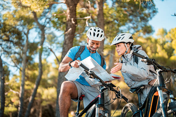 istock Outdoor Adventure Planning by Diverse Couple with E-Bikes 2227617880