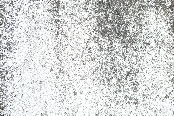 Weathered and cracked concrete wall, displaying age and texture. backgrounds or urban themes