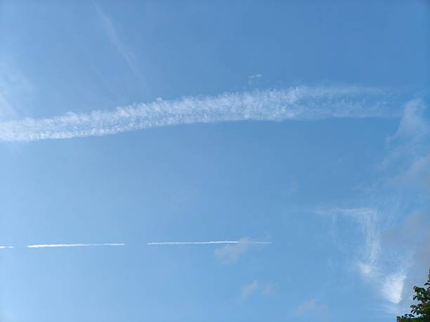 istock The evening sky was clear blue with white clouds in horizontal and lumpy stripes. 2227624136