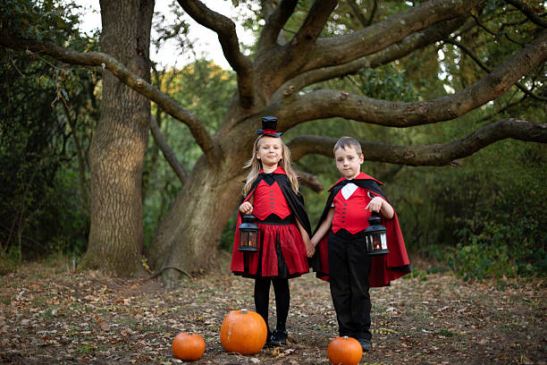 Children dressing for Halloween with pumpkins and lanterns. in Corby, England, United Kingdom
