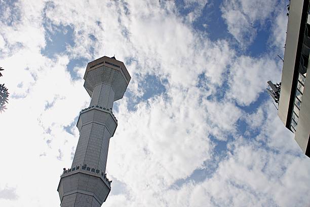 low angle view of Bandung Grand Mosque Tower Against cloudy Blue Sky. Masjid raya bandung