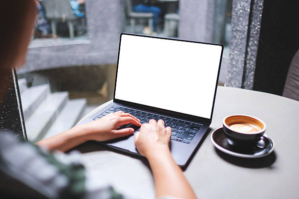 istock Mockup image of a woman working and typing on laptop computer with blank white desktop screen in cafe 2227632275