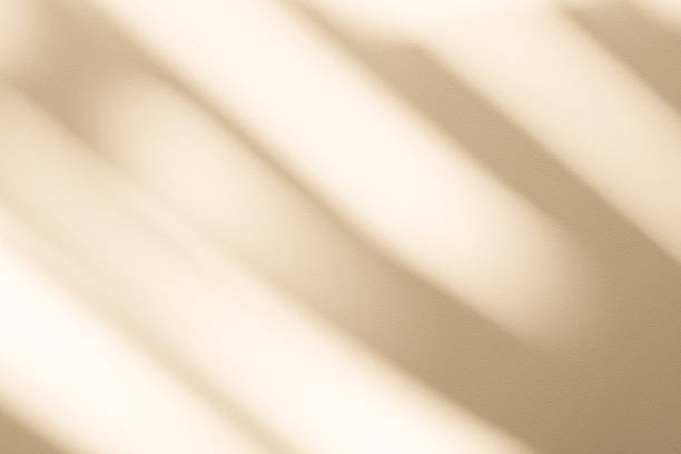 istock Studio style background wall decoration presentation uses white and beige tones. with shadows cast from a nearby window, concept creating a decorative 2227634191