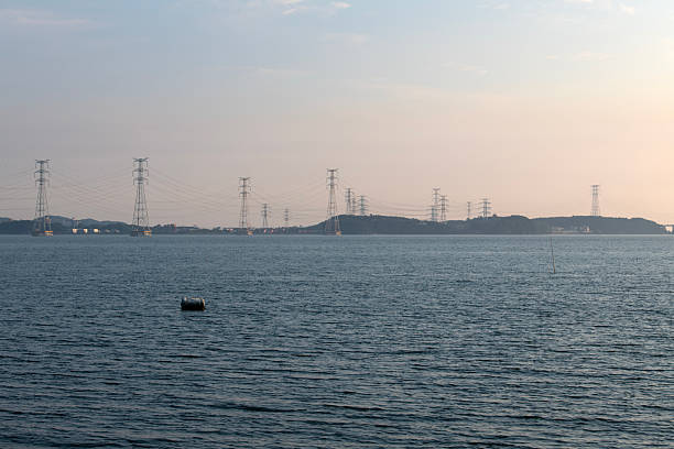 istock electricity pylon on the sea 2227634220