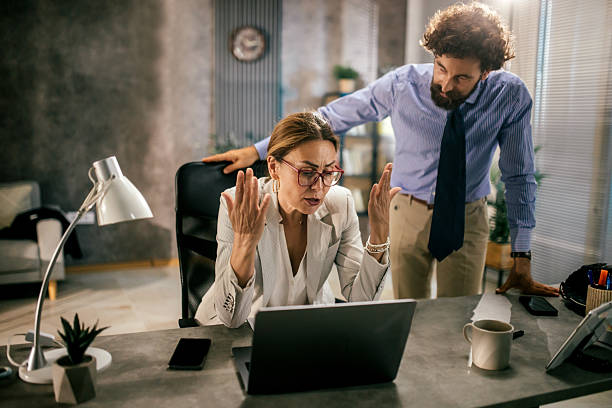 istock tension in the workplace , business partners under pressure ,business problem 2227637174