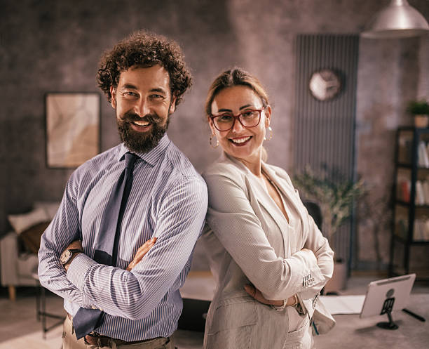 istock professional team posing with arms crossed and positive attitude 2227639606