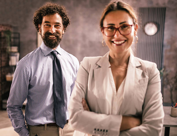 istock professional team posing with arms crossed and positive attitude 2227639611