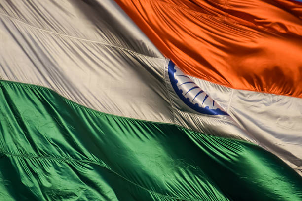 Geographical border of India textured with Turkish flag on white background. Horizontal composition with clipping path.