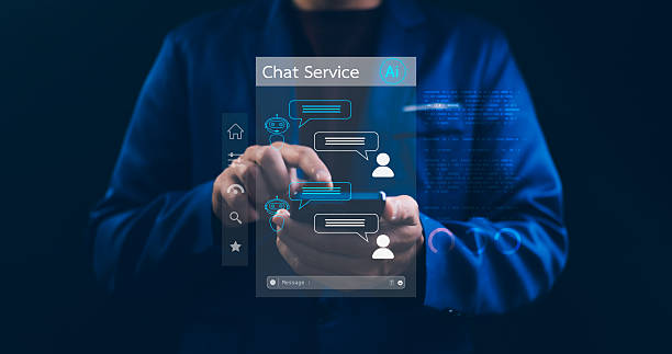 istock Businessman using smartphone touching a virtual screen for online conversation with an intelligent assistant bot. Futuristic AI chatbot interface for customer service. 2227640798