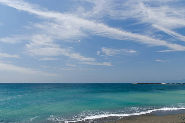 Blue sky and turquoise ocean sea as seen from Chigasaki's Southern Beach, Kanagawa, Japan