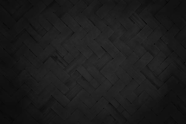 istock Old black bamboo weaving pattern, woven rattan mat texture for background and design art work. 2227644370