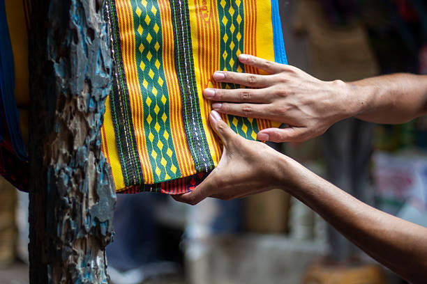 istock A man holds a plastic bag in the market 2227644608