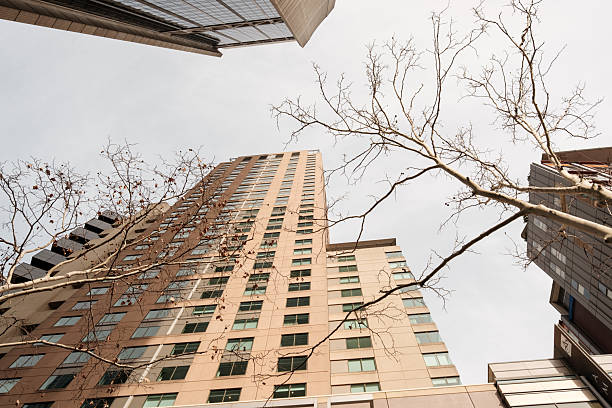 istock Tall city buildings on a cold overcast winter day 2227646850