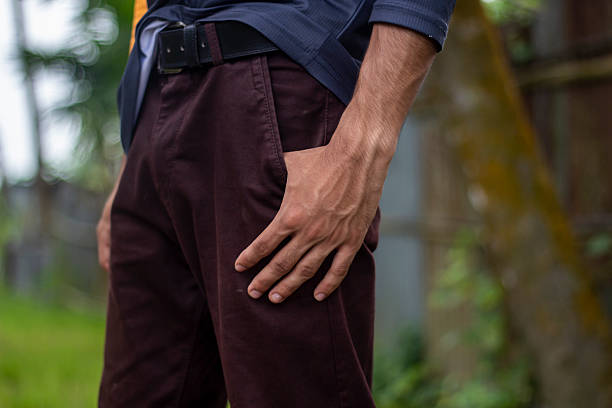 istock A man shows his hand in his pocket, and the background is blurred 2227646987