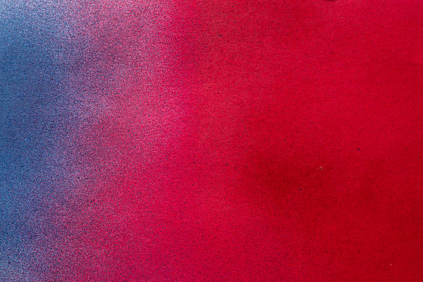 istock Red and blue spray paint background 2227648018