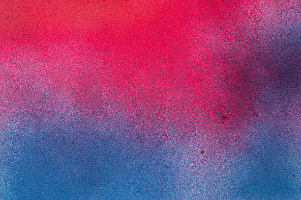 istock Red and blue spray paint background 2227648034