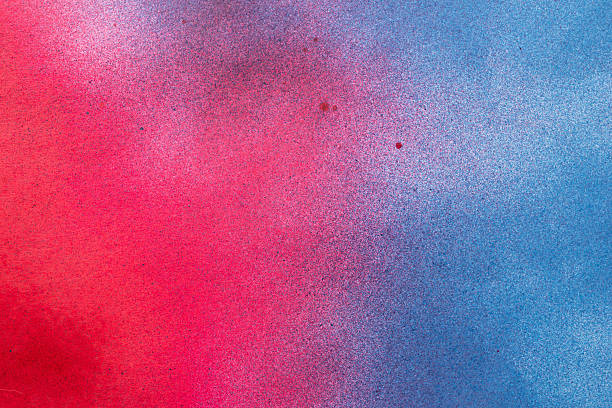 istock Red and blue spray paint background 2227648050