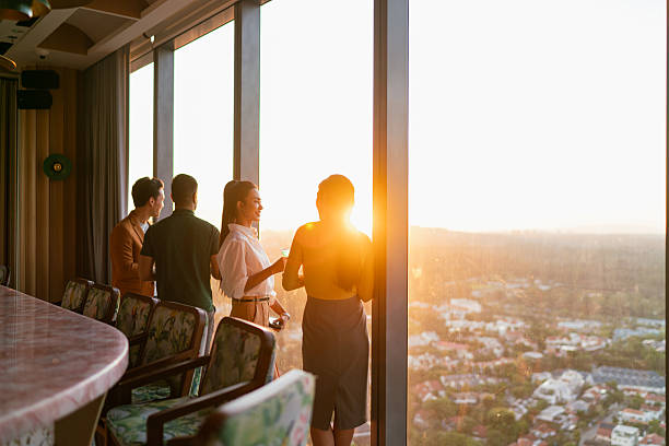 istock Diverse Asian co workers meet for cocktail after work hours 2227652401