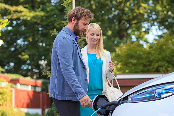 istock Couple charging the car before going to work 2227652674