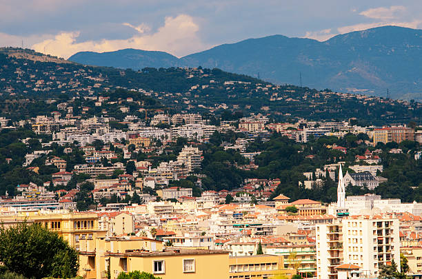 istock Peaceful mountain view overlooking the city of Nice under a cloudy sky 2227653483