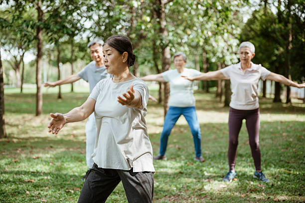 istock Healthy retirement lifestyle with Tai Chi practice。 2227655747