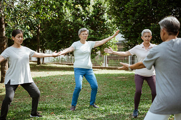 istock Healthy Aging – Seniors Doing Tai Chi in Nature 2227655829