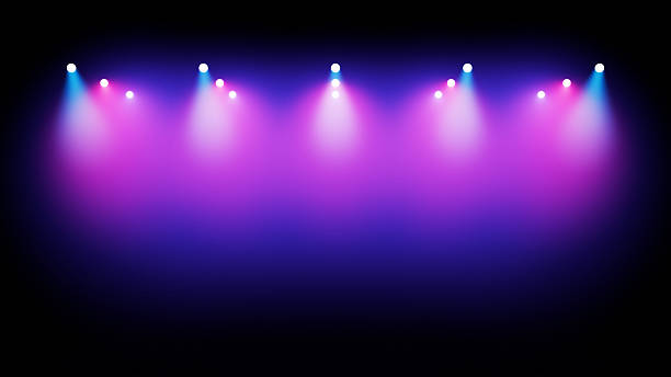 Row Of Bright Stage Spotlights In Shades Of Blue And Pink Illuminating Smoke Against A Dark Background, Suitable For Concert, Event Or Performance Themes