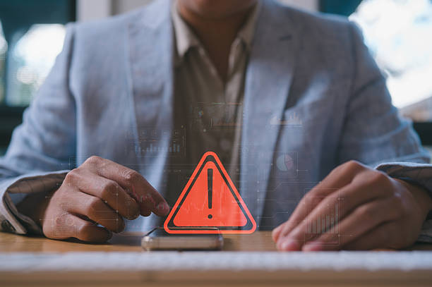 istock Cybersecurity Warning Alert on Mobile Device in Business Environment 2227663354