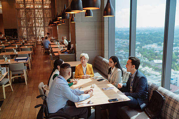 istock Diverse Asian business team meeting during unch 2227663765