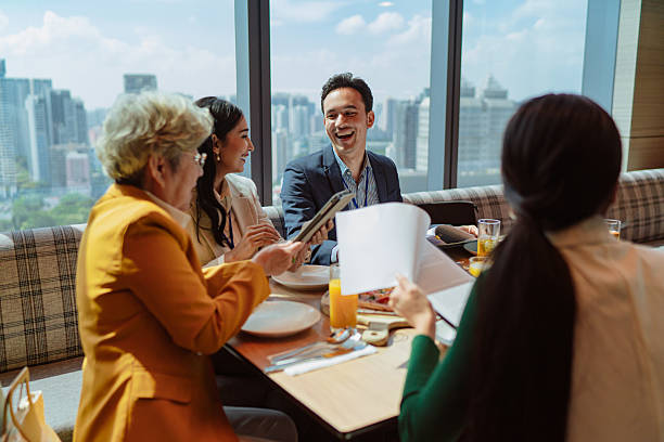 istock Diverse Asian business team meeting during unch 2227664032