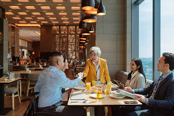 istock Diverse Asian business team meeting during unch 2227664403
