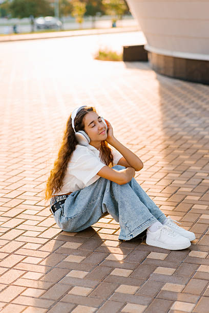 istock Girl Relaxing On Urban Pavement 2227665851