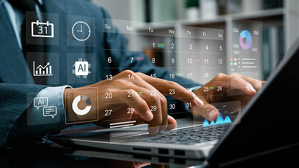 istock Businessman manages time for efficient work and project analysis, Ai technology time management concept, highlight appointment reminders and agenda on calendar, virtual screen calendar. 2227667658