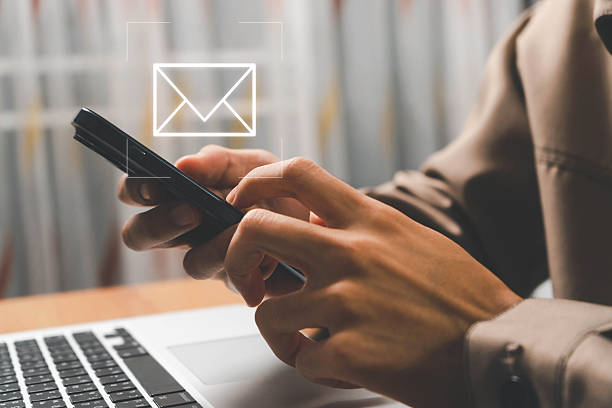 istock Email marketing concept, Human touch on email and surfing the internet with email icon, email icon, e-mail communication, e-mail marketing concept, send e-mail or news letter, online working internet. 2227667687