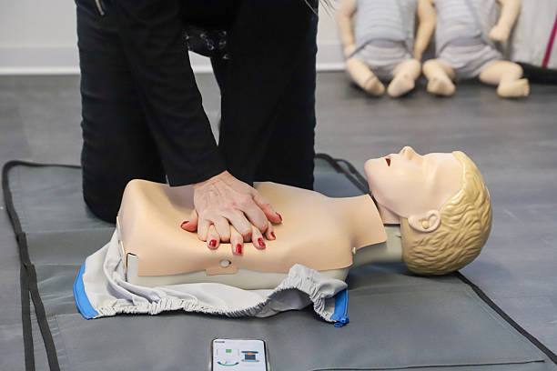 istock first aid course - company safety - cardiac massage - Basic Life Support 2227671386