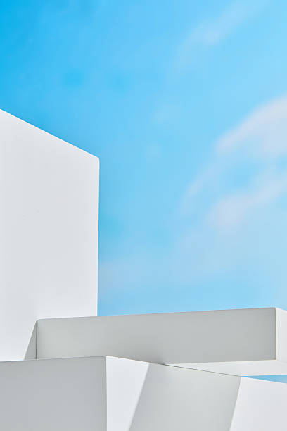 istock Abstract white geometric blocks under bright sky, offering clean space for creative product photography of sunscreen or outdoor cosmetics. 2227671502