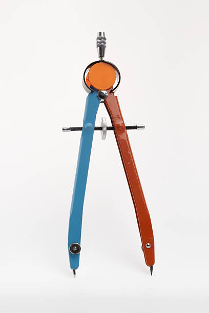 istock A metal geometric compass. It has two distinct arms, one in blue and the other 2227672496