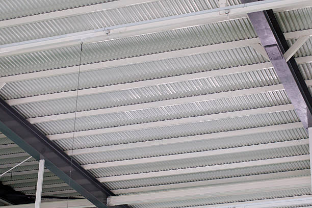 istock Corrugated Metal Roof with Steel Beam Support Structure 2227677266