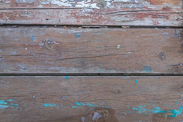 istock Weathered Wooden Planks with Peeling Paint Texture 2227679003