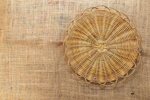 Brown wicker picnic basket front view isolated on white