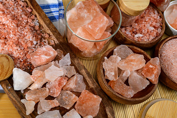istock Himalayan salt - various types and sizes on a table - close up shot 2227679335