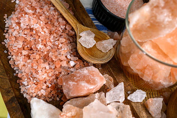 istock Himalayan salt - various types and sizes on a table - close up shot 2227679358