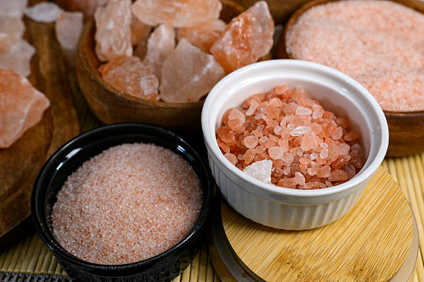 istock Himalayan salt - various types and sizes on a table - close up shot 2227679427