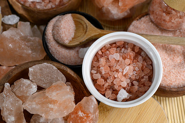 istock Himalayan salt - various types and sizes on a table - close up shot 2227679462