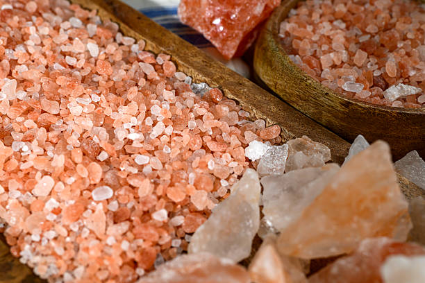 istock Himalayan salt - various types and sizes on a table - close up shot 2227679554
